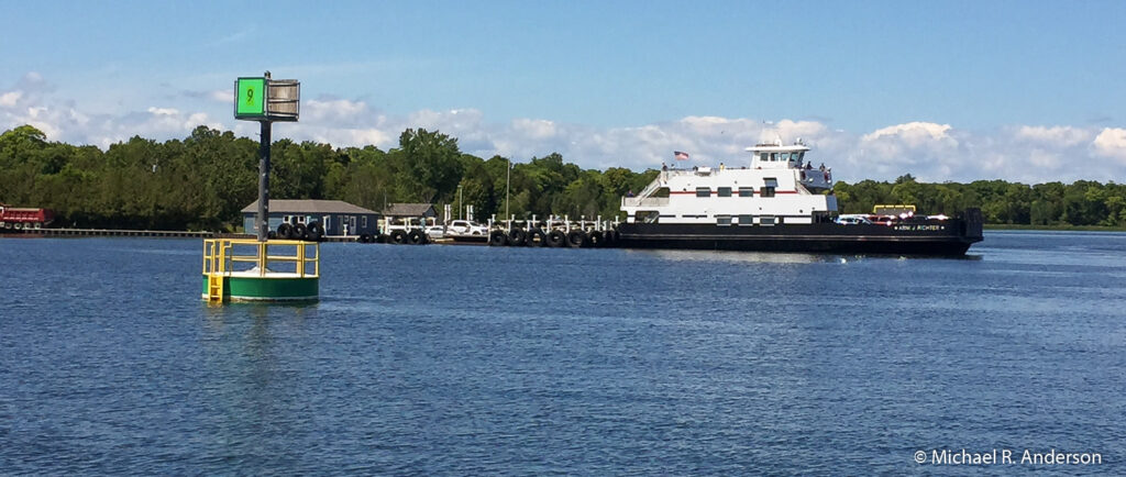 A picture of the ferry Arni J. Richter loading cars at the dock on Washington Island.